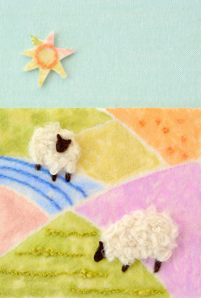 羊が草原にいる羊毛フェルトのイラスト