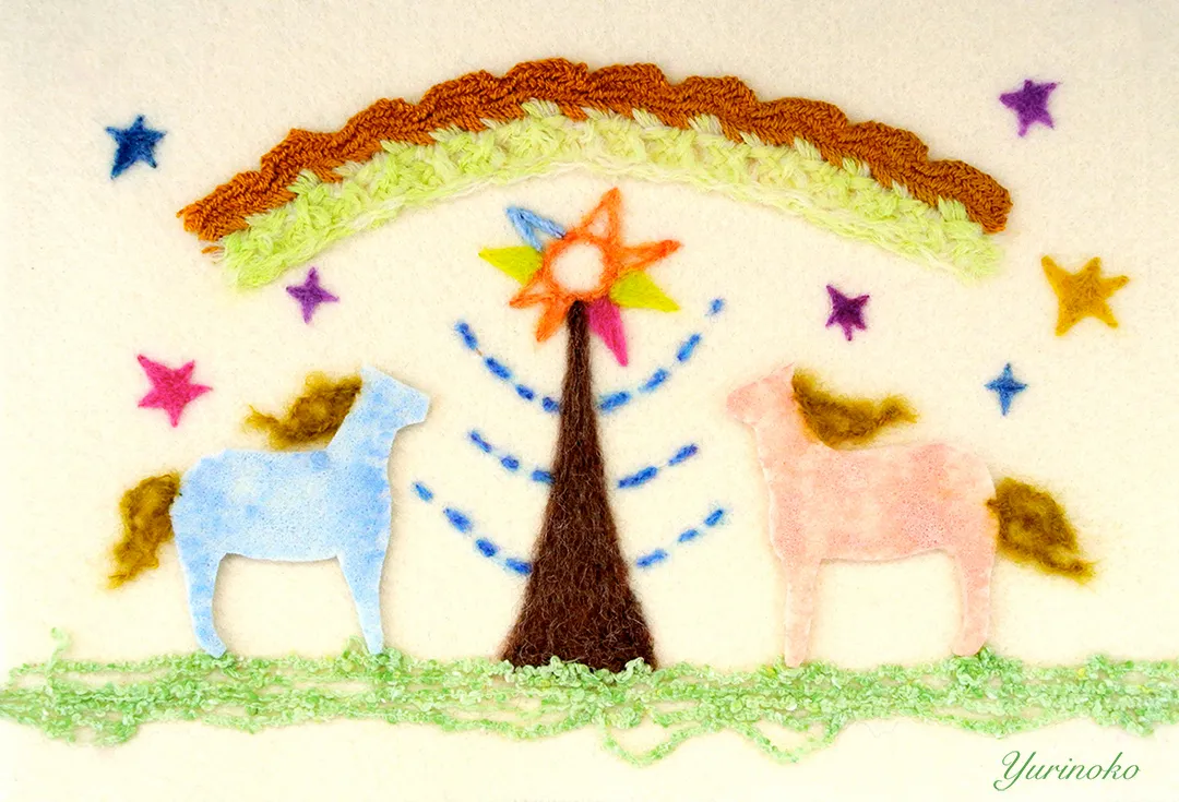 フェルトのイラスト。2匹の馬が草原にいて木があり、空には虹がある